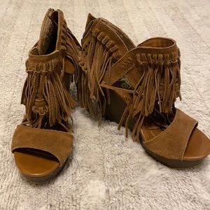 Camel colored wedge sandal with fringe. Size 8